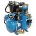 Dental chair package with dentist and assistant stools, sterilizer, compressor, and vacuum from DENTAMED USA.
