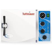 Dental chair package by DENTAMED USA with dentist and assistant stools, sterilizer, compressor, and vacuum system in a clinical setup.